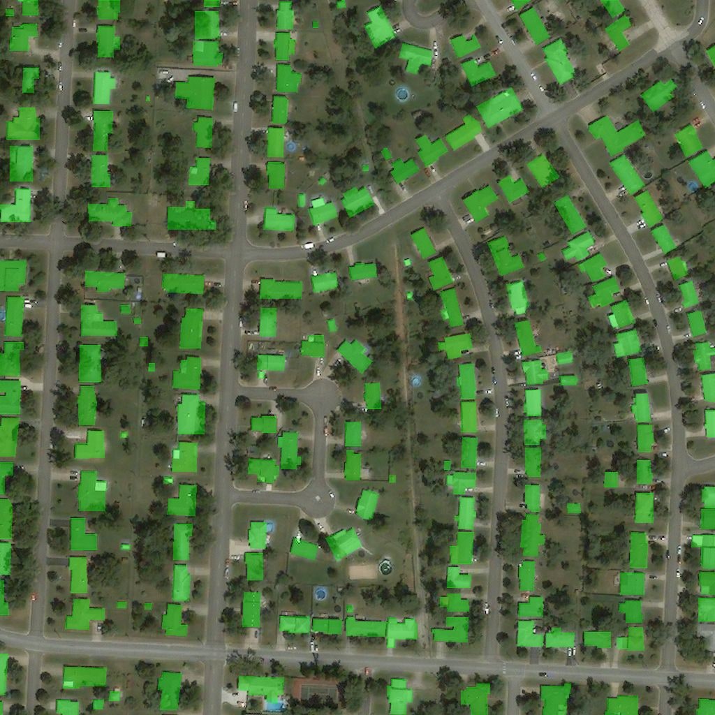 The before tile with every building footprint filled in green